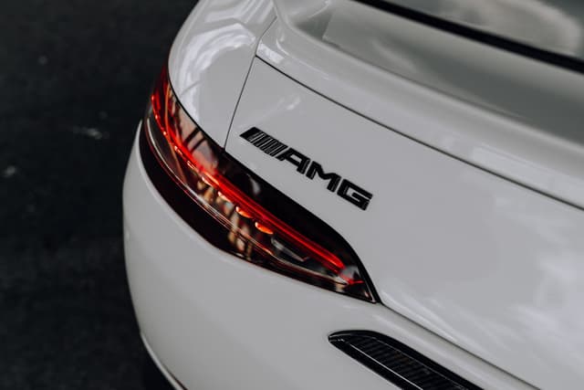 AMG GT Logo Colored in Black Lettering X290 Genuine Mercedes-AMG (part number: A2908174500)