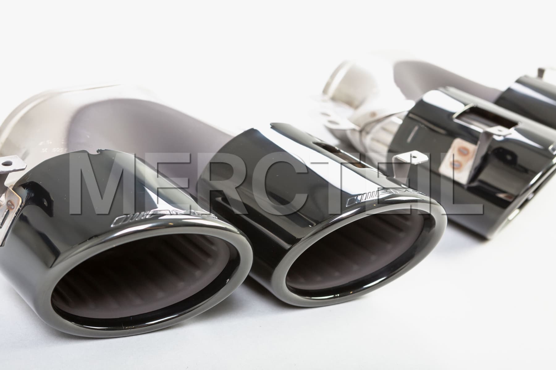 https://mercteil.com/s3/black-exhaust-tailpipe-covers-45-s-amg-look-kit-c-x-118-w-177-h-247-genuine-mercedes-amg-1691411143955-x2.jpg