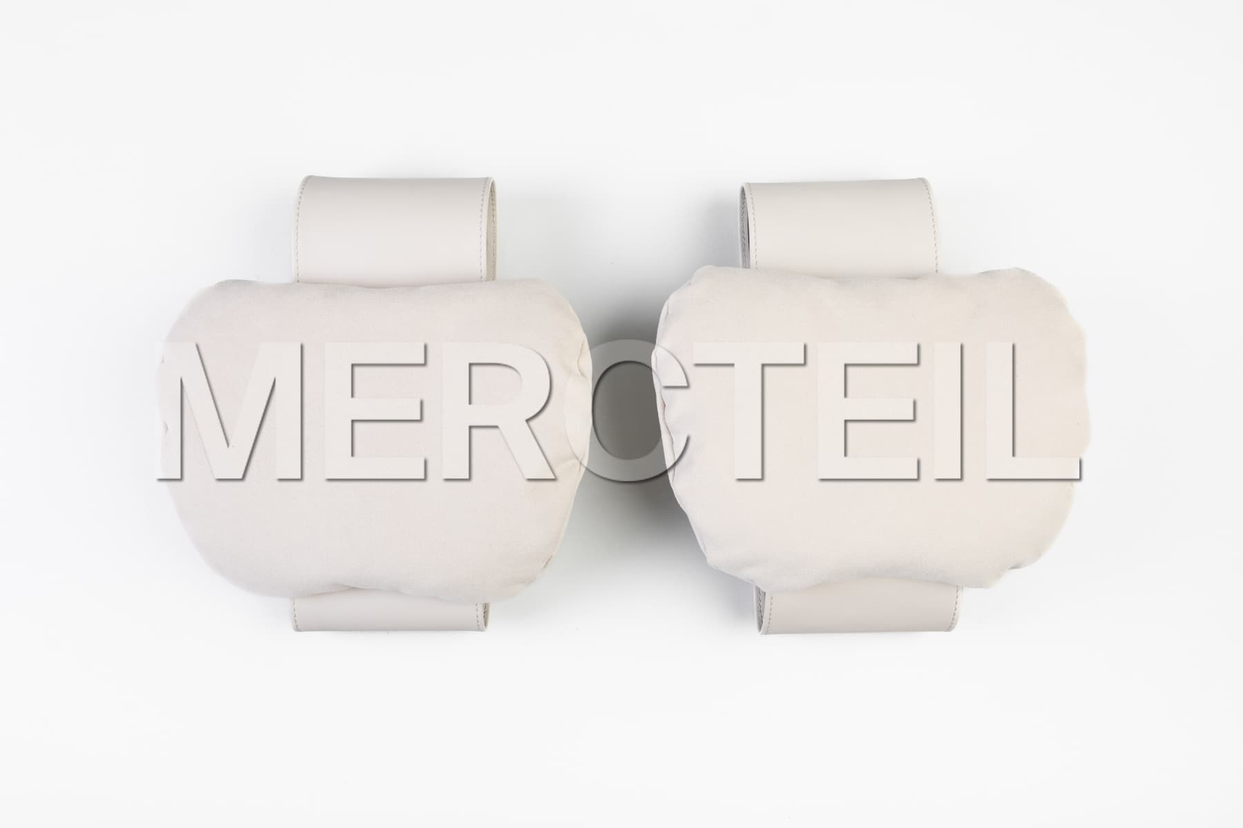 https://mercteil.com/s3/mercedes-headrest-pillow-set-ultra-soft-genuine-mercedes-benz-1700781549925-x2.jpg